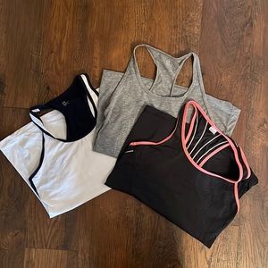 Three GapFit small and x-small workout tank tops